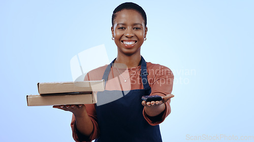 Image of Woman, pizza boxes and payment machine for delivery, e commerce, and POS customer service on blue background. Portrait of african cashier and fast food order, fintech or digital transaction in studio