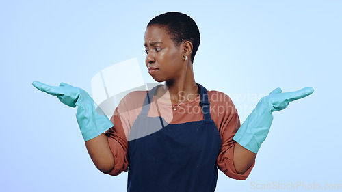 Image of Woman, cleaner and gloves with hands, question and confused for cleaning service and blue studio background. Housekeeper, maintenance and doubt for hygiene, decision and hand gesture for mockup space