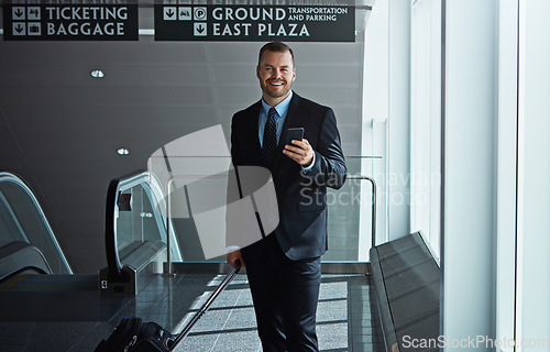 Image of Travel, portrait or businessman in airport with phone, luggage or suitcase on social media. Booking, happy entrepreneur or corporate worker texting to chat on mobile app on international flight