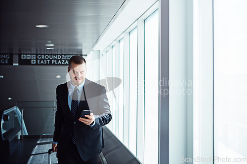 Image of Walking, news or businessman in airport with phone, luggage or suitcase for travel booking. Smile, entrepreneur or corporate worker texting on mobile app or social media on international flight