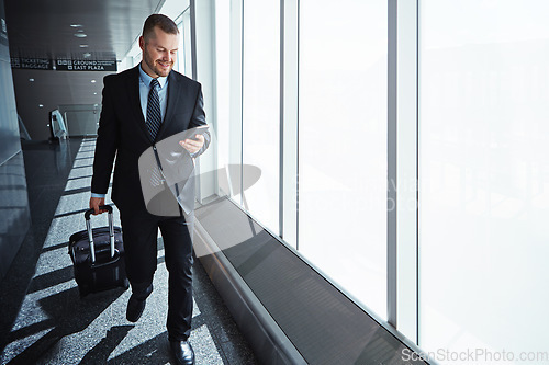 Image of Business man, phone and texting in airport for smile, luggage or email notification on international travel. Entrepreneur, bag or smartphone for flight schedule, global immigration or idea in London