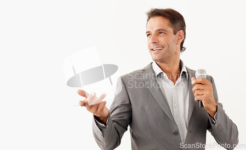 Image of Man, microphone and smile in speech, studio and motivational or public speaker, tv and white background. Happy mature person, broadcast and feedback or voice, anchor and media or influencer in mockup