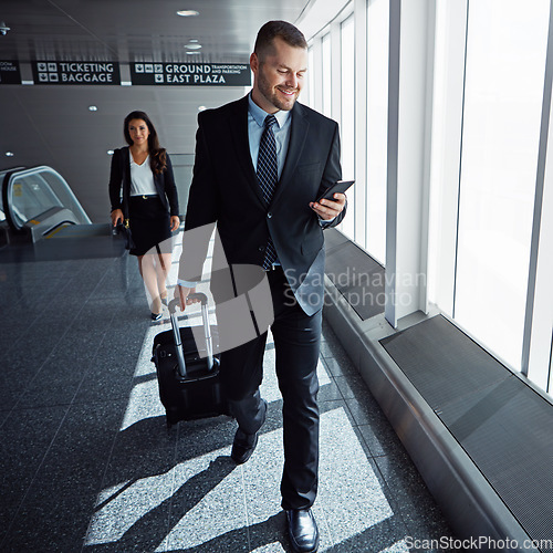 Image of Business man, smartphone and suitcase in airport hallway with smile, thinking or idea for international travel. Entrepreneur, luggage and phone with flight schedule for global immigration in London