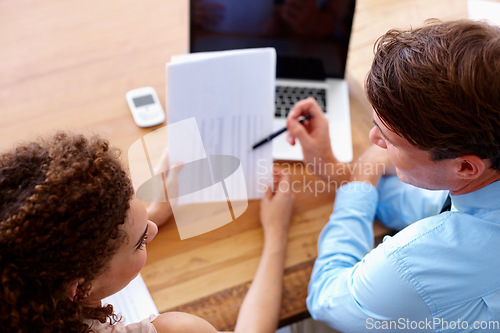 Image of Document, discussion and business people in collaboration in the office planning a legal agreement. Professional, paperwork and top view of team of lawyers in conversation with contract in workplace.