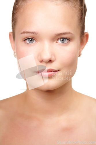 Image of Teenager, portrait and natural skincare in studio for glow or clear, hygiene on white background. Female person, model and face for dermatology confidence for health wellness, calm shine or collagen