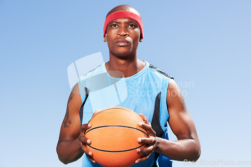 Image of Confident, basketball player and outdoor portrait for sport, game and competition in summer with sky background. Serious, black man and exercise with ball, goals or fitness from playing and training