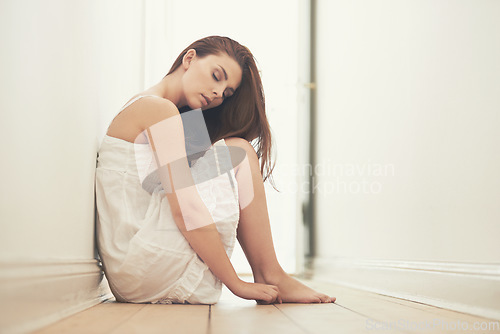 Image of Relax, woman and home with fashion, floor and peace with style, clothes and calm in a hallway. Person on the ground, model and girl with beauty, eyes closed and ideas with thinking and apartment