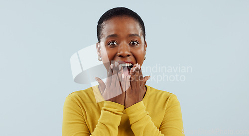 Image of Happy black woman, portrait and surprise in wow, winning or lucky prize against a studio background, Face of excited African female person smile in joy for bonus, promotion or sale promo in discount