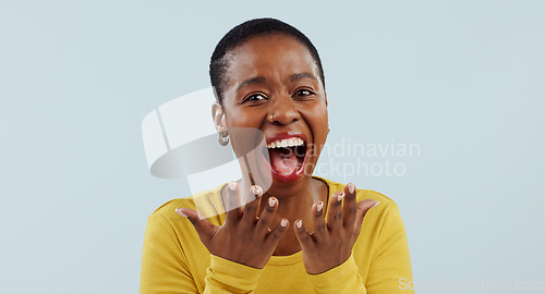 Image of Excited black woman, portrait and face in surprise for winning, prize or celebration against a studio background. Happy African female person in wow, shock or bonus promotion on sale discount or deal