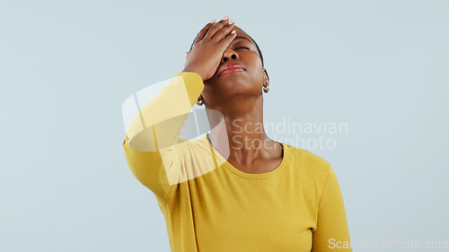 Image of Frustrated black woman, headache and mistake in fail, stress or anxiety against a studio background. upset or disappointed African female person migraine in depression, burnout or fatigue on mockup