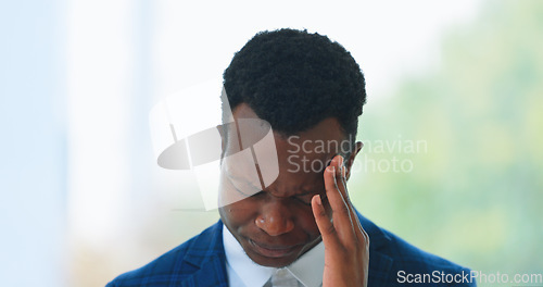 Image of Business, man or headache in office with stress, burnout or risk in corporate company from migraine. Black person, employee or entrepreneur and tired, anxiety or discomfort from strain at workplace
