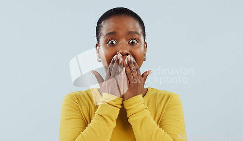 Image of Woman, shocked and surprise or cover mouth for gossip, news of sale, announcement or information in studio. Portrait of african person with wow or excited for story or secret on a white background