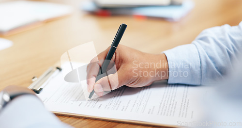 Image of Closeup, hand and signature for clipboard in office for writing on legal form, compliance or application. Person, lawyer or document by information, reading or agreement by contract paperwork on desk