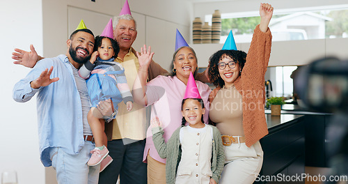 Image of Happy family, birthday hats and photography for party, children and parents. House, grandparents and celebration with timer, excited and cheers with hands, wow and bonding together for memories