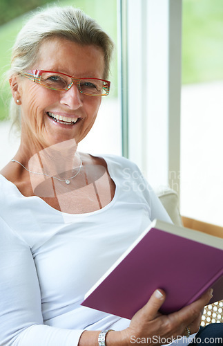 Image of Mature, woman and portrait for book reading or relax morning, information or knowledge learn. Senior person, face and glasses for retirement education in home for study hobby, research or happy peace