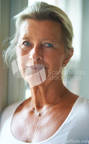Image of Senior, woman and portrait for natural beauty confidence in age care, grace wrinkles in home. Old person, face and pride eyes in retirement as pensioner in house for calm peace, rest memory or relax
