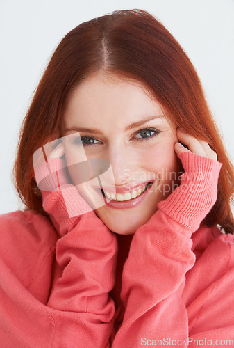 Image of Smile, happy and portrait of woman in a studio with positive, good or confident attitude. Peaceful, calm and young female model from Canada with optimistic expression isolated by white background