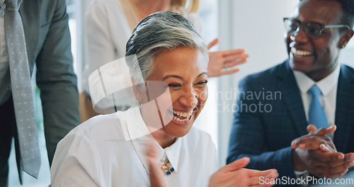 Image of Happy woman, business people and group celebrate, applause and cheers for corporate deal, promotion or goals achievement. Group praise, winner congratulations and mature CEO clapping for success news