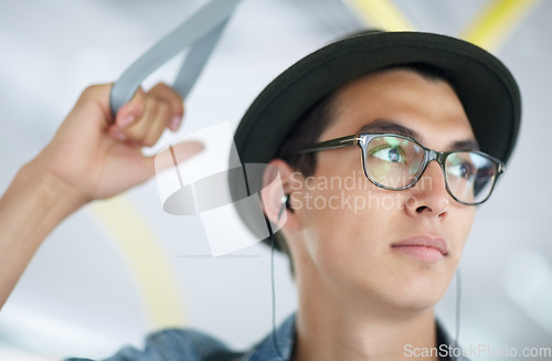 Image of Man, bus and earphones for music, commute and adventure or travel, transportation and thinking on trip. Male person, streaming radio and audio or song, playlist and journey or freedom with podcast