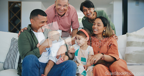 Image of Happy, smile and big family playing on sofa in the living room at modern home together. Bonding, love and young kids relaxing with parents and grandparents for generations in the lounge at house.