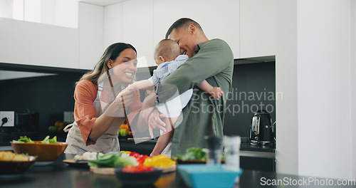 Image of Family, smile and play or cooking, love and bonding or fun, relax and support or laughing at home. Happy parents and baby, connect and humor or funny, joy and relaxed or silly, goofy and kitchen