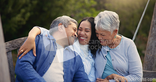 Image of Happy family, senior parents or woman on bench in nature, hug or bonding in smile on retirement. Mature man, mother and older daughter for together in laughter, lounge and embrace for love in garden