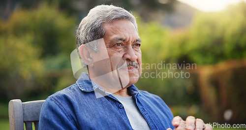 Image of Senior, man or thinking outdoor for memory, lonely or retirement with alzheimer on bench. Elderly, person or nostalgia, thoughtful and peace in nature or park with wonder, depressed or remember life