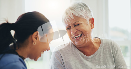 Image of Happy woman, doctor and senior patient laughing in elderly care for funny joke, humor or comedy at old age home. Nurse or medical caregiver smile or laugh with mature person in bonding at house