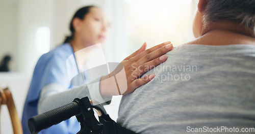 Image of Woman, hand and nurse with patient in wheelchair for elderly care, support or trust at old age home. Closeup of medical doctor or caregiver listening to person with a disability for health advice