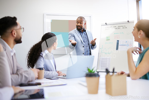 Image of Presentation whiteboard, business people meeting and black man speech, report or teaching group, team or clients. Strategy planning, gesture or speaker explain project to listening professional staff