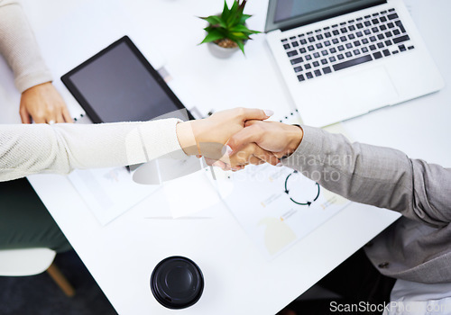 Image of Client meeting, top view people and hand shake for negotiation success, B2B deal or company acquisition. Business, welcome introduction and partner agreement, cooperation and handshake for promotion