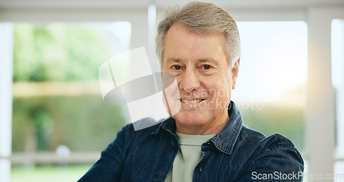 Image of Old man, portrait and morning in home and retirement with happiness and health. Senior, person and smile on face in house to relax with sunshine in apartment, living room or lounge on vacation