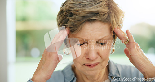 Image of Frustrated senior woman, headache and mistake in stress, burnout or anxiety and depression at home. Closeup of mature female person with migraine, pain or sore head in mental health or fail at house