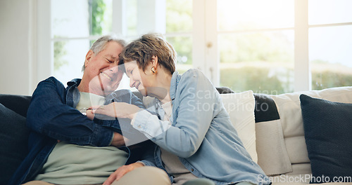 Image of Love, home and mature couple laughing at funny conversation, retirement joke and smile on living room sofa. Wellness, comedy humour and relax old man, senior woman and elderly marriage people bonding