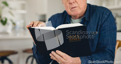 Image of Reading, Bible and hands of old man in home with Christian worship, prayer or education in faith. Elderly, person or studying holy gospel, religion or trust in God or spiritual learning in retirement