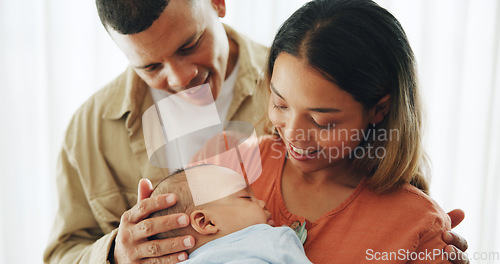 Image of Family, love and parents with baby happy for bonding, healthy relationship and childcare in home. Smile, childhood and mother, father and newborn infant embrace, care and relax together for happiness