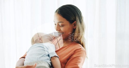 Image of Family, love and mother with baby in home for bonding, healthy relationship and childcare in bedroom. Happy, childhood and mom and newborn infant embrace, care and affection together for happiness