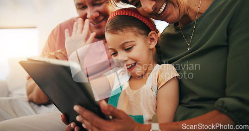 Image of Tablet, video call and child with grandparents on sofa in the living room of modern family house. Happy, virtual communication and girl on digital technology relaxing with senior people at home.