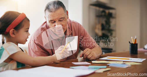 Image of Happy grandpa, little girl and learning to read and write for literature, education or bonding together at home. Grandparent with child or kid at homeschool for knowledge, study or lesson at house