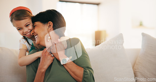 Image of Child, grandmother and hug on sofa happy for laugh bonding, relax connection in retirement. Girl, old woman and embrace on couch for holiday rest or together in lounge for funny joke, love or care