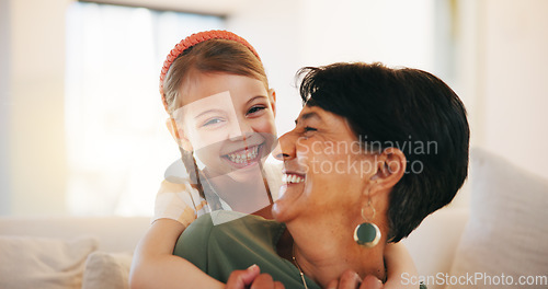 Image of Child, grandmother and hug on sofa for laugh bonding, relax connection in retirement. Girl, old woman and embrace on couch for holiday rest or together in lounge for funny joke, love support or care