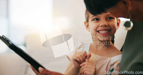 Image of Home, grandmother on a sofa and girl with tablet, happy and relax with social media, internet and digital app. Apartment, senior woman and pensioner with grandchild, technology and online games