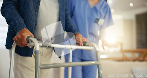 Image of Senior man, person with disability and walking frame for support, nurse and handholding. Healthcare, elderly for medical care, patient rehabilitation and physiotherapy for injury and recovery help