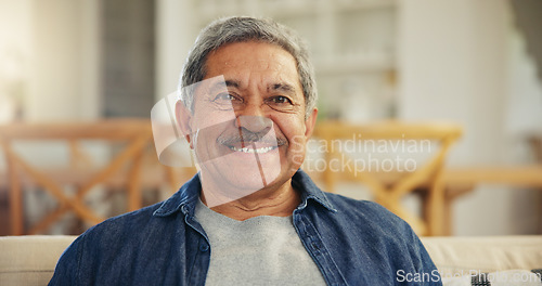 Image of Portrait, senior man and smile in home to relax for retirement, confidence and good mood. Happy face, elderly guy and pensioner on sofa in living room with wisdom, old age and optimism in Colombia