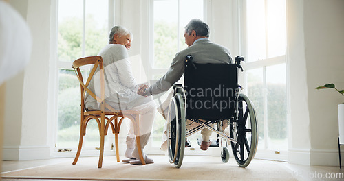 Image of Man, wheelchair and woman comfort in home for relationship bonding, love trust or helping hand. Wife, and husband with a disability together in morning or retirement relax, care compassion or support