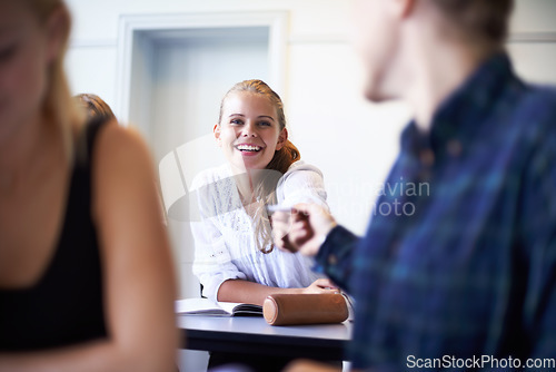 Image of Student, note and pass a letter in class at high school with friends and social communication. Hand, paper and teenager writing secret, crush and information in classroom with quiet conversation