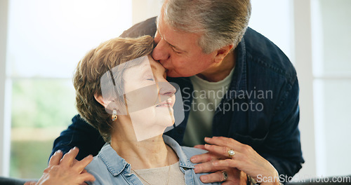 Image of Face, love and kiss with senior couple affection, trust and sweet husband with wife, spouse or partner in Argentina. Care, home lounge and relax old man, woman or elderly marriage people bonding