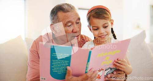 Image of Grandfather, child and reading book on sofa for literature, education or bonding together at home. Grandparent with little girl or kid smile for story, learning or relax on living room couch at house