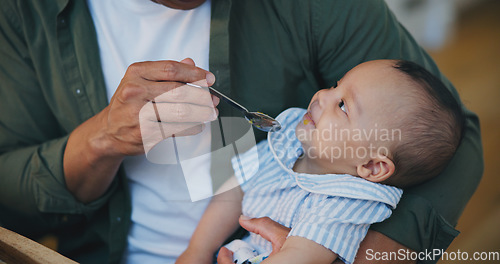 Image of Man, feed and baby or food closeup with spoon as nutrition meal, health or cooking. Male person, hand and childhood development or parent love connect for dinner diet or growth, happy kid or vitamin