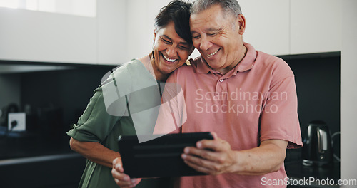 Image of Senior couple, tablet and video call for social conversation, kitchen and lunch time. Grandparents, technology and communication with family, man and woman in retirement, happiness and connection